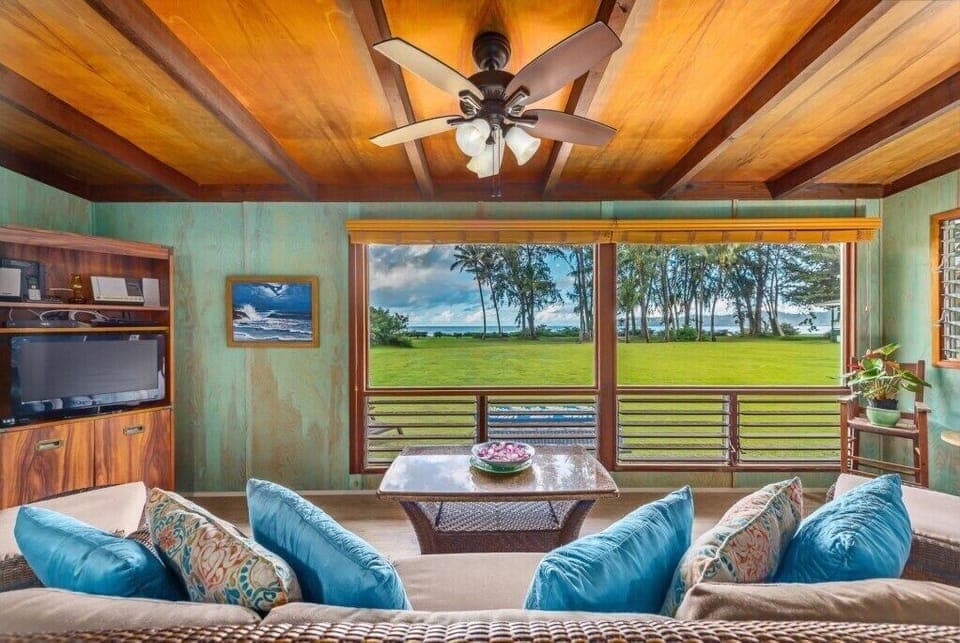 HMBC Living Room Ocean Front View - Hanalei Moon has you enjoying Hanalei Bay from your cozy ocean front living room.