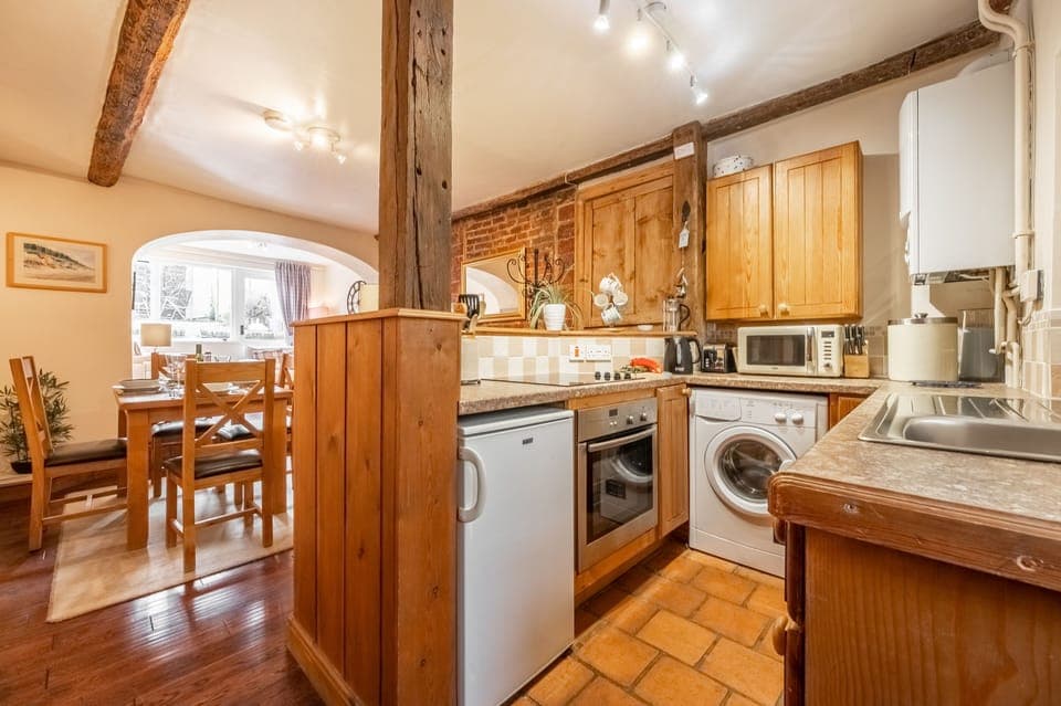 Ground floor: Kitchen with dining area beyond