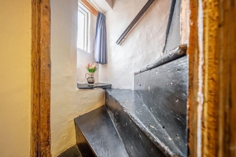 Original staircase to first floor