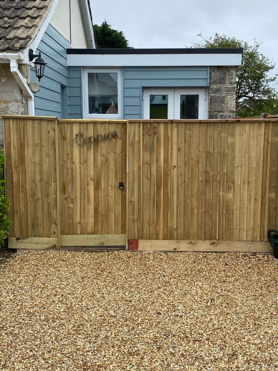 Front of the Coppice & access in, small patio area, parking on shingle outside! 