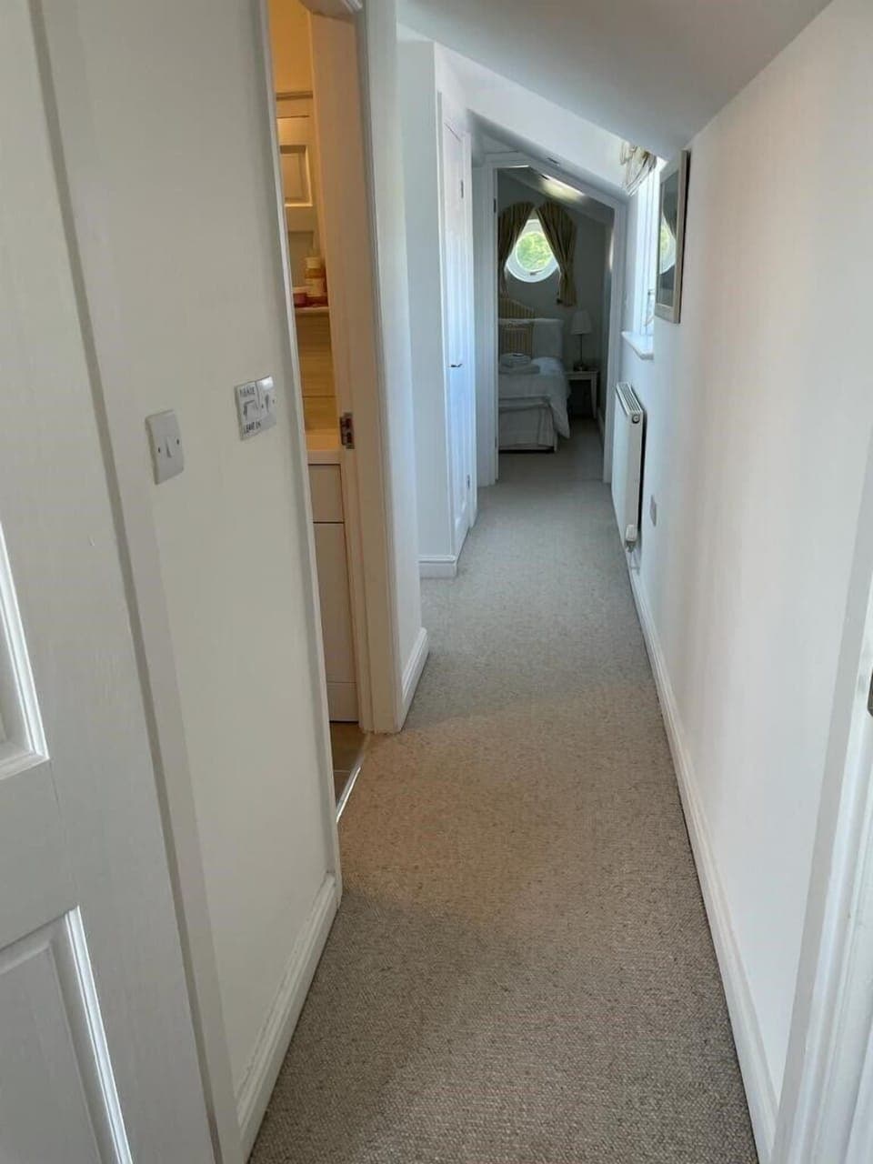Hall way to the bathroom and bedrooms