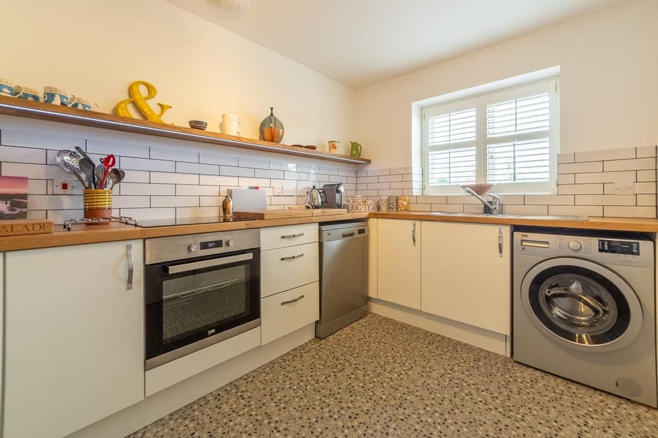 Ground floor: Kitchen with window to the front
