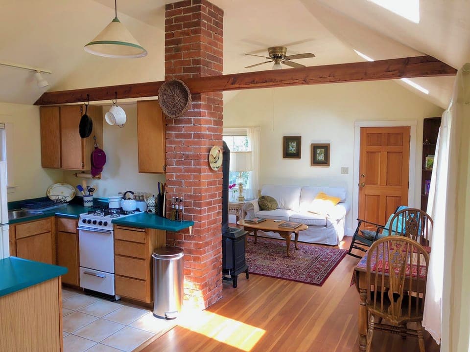 The main living area has an open floor plan. Bathroom & bedroom both have doors.