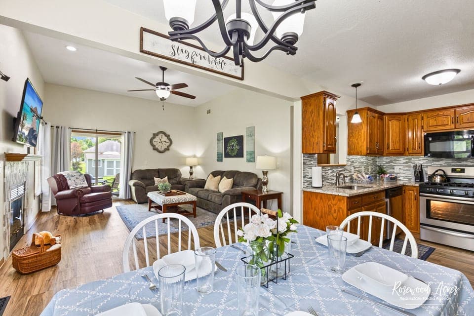 Spacious eat in in dining room that looks into living room.