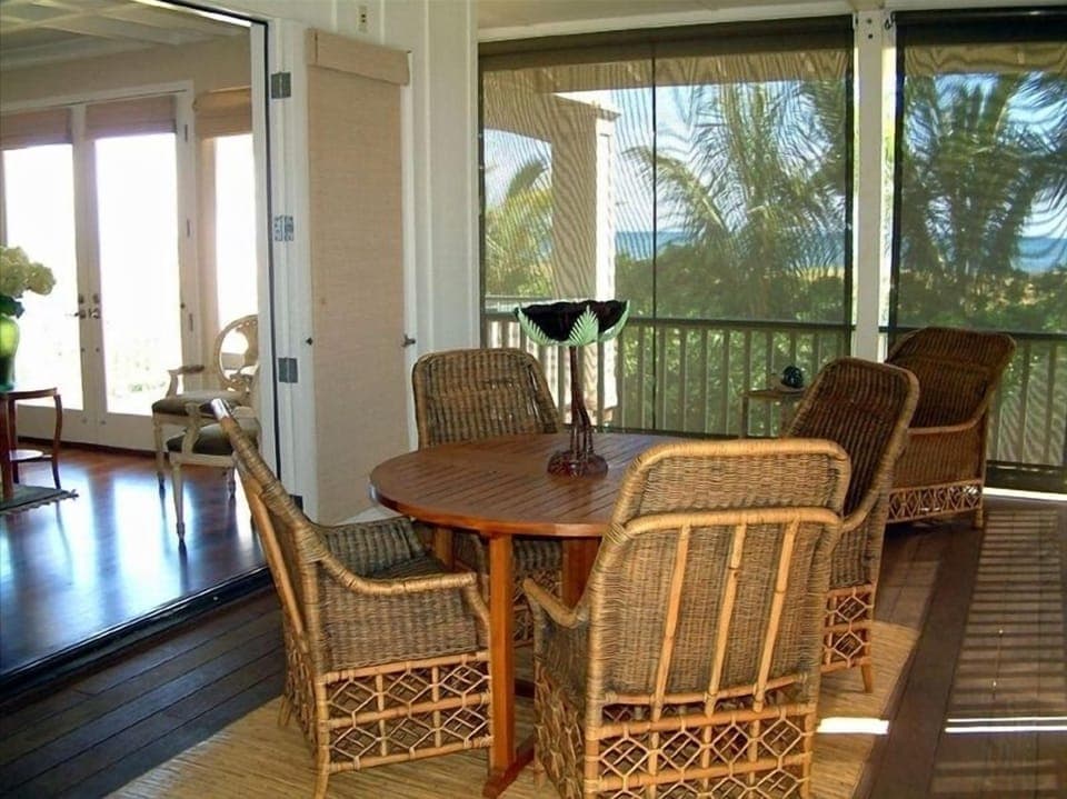 Ocean side dining anytime you wish on the screened in lanai