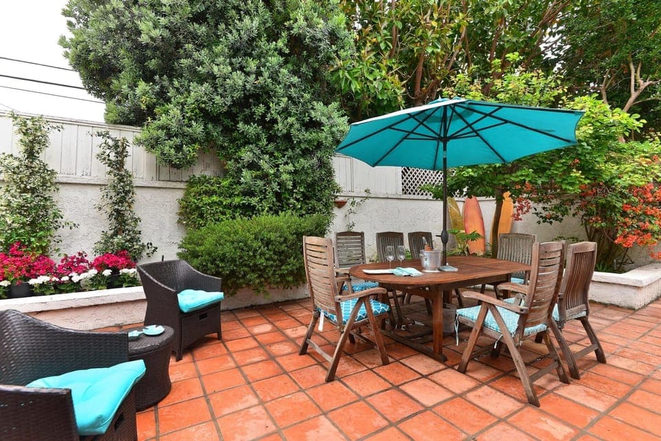 Large Private Patio with Teak Table and Chairs