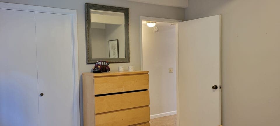 Private bedroom w/queen bed on main floor off kitchen.