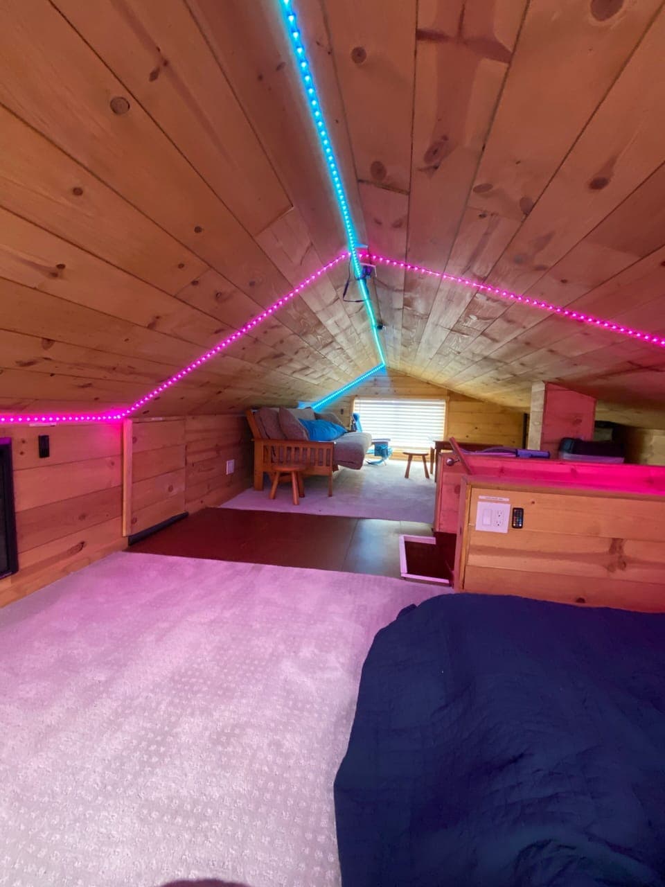 Ridiculously comfortable futon couch folds to a Queen Bed. Led lights, Tv, kids❤️