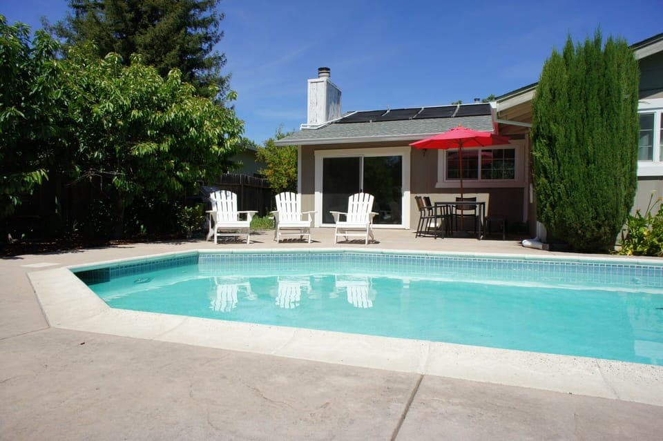 Kitchen connects seamlessly to outdoor dining area and pool.