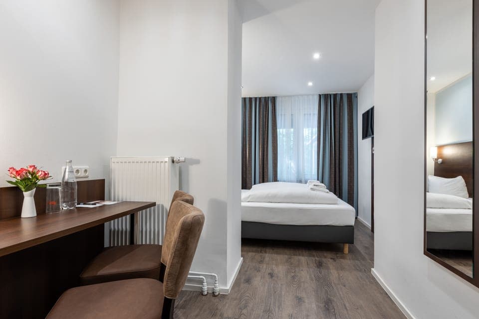 Standard Twin Room | Desk, blackout drapes, soundproofing, iron/ironing board