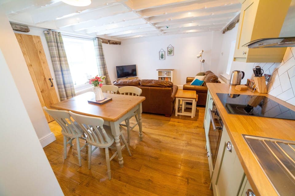 Open plan dining and kitchen area, great for socialising.