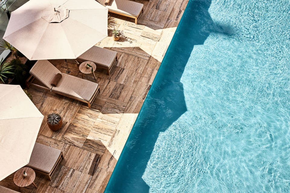 Outdoor pool, open 8:00 AM to 10:00 PM, cabanas (surcharge)