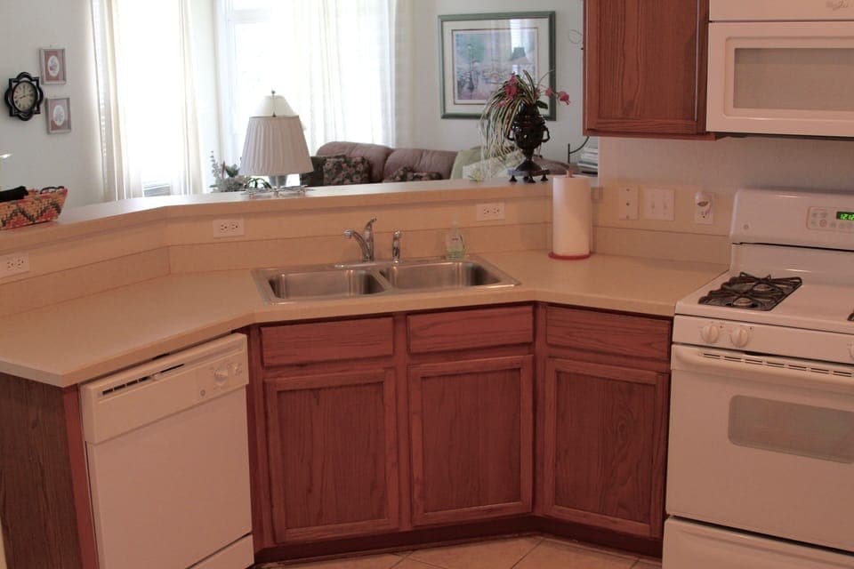 corner side by side sinks and garbage disposal. 
Convenient to living spaces