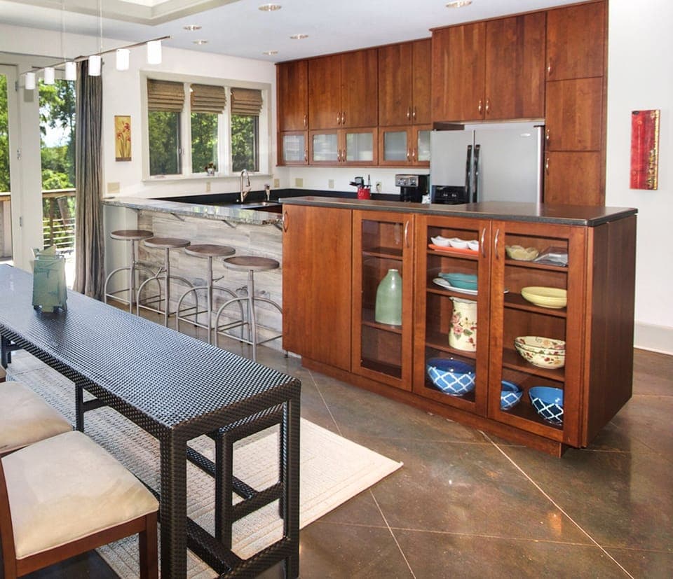 Dining for 8-12 upstairs. Bar for 4 w/ cool stools & barnwood siding. 
