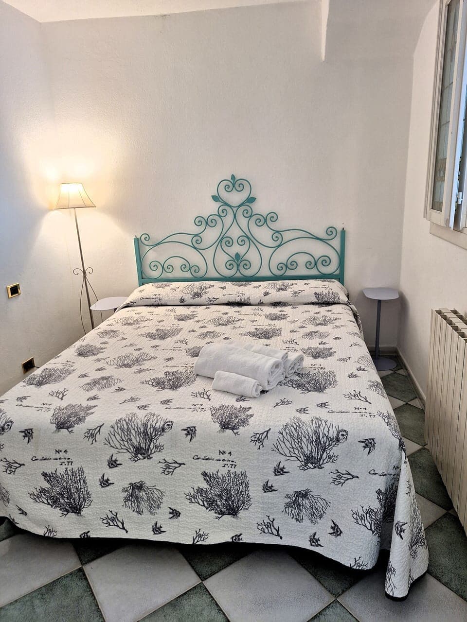 My hand made antique wrought iron bed has been newly renovated.