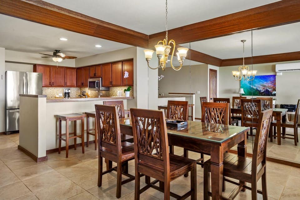 Dining Table seats 6, room for 3 on barstools at the bar.