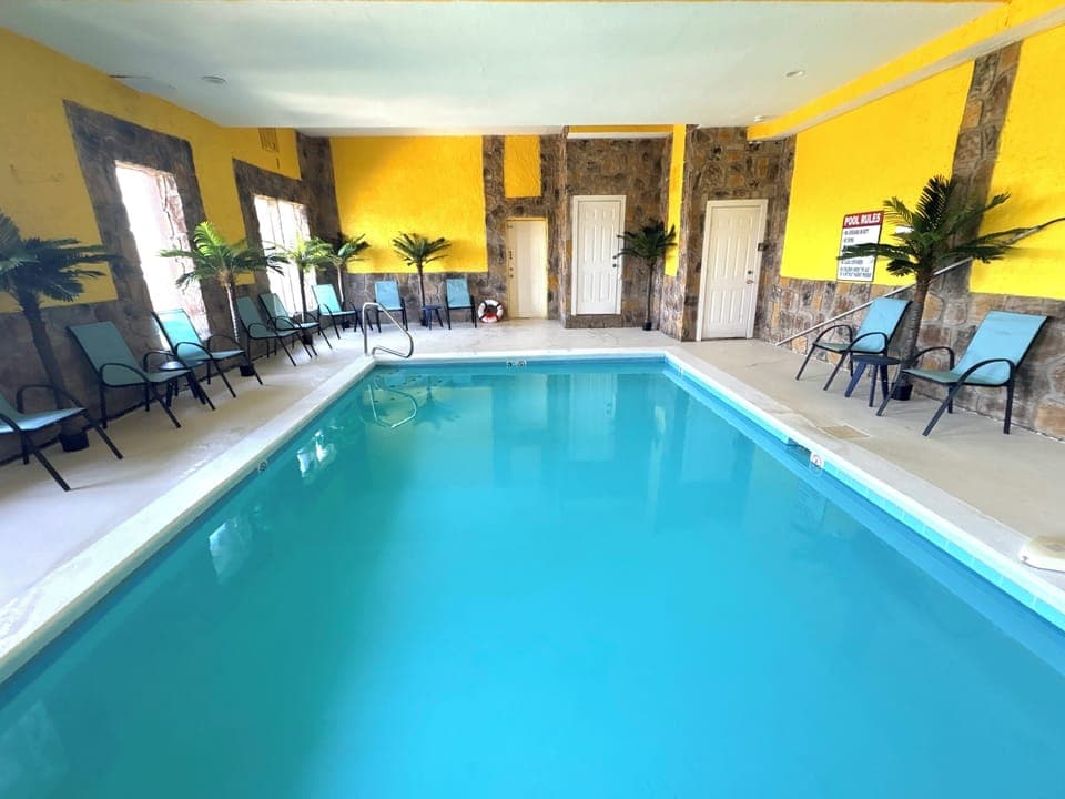 3’-5’ deep. Heated pool up to 85 degrees.  (Not kept at hot tub temps)