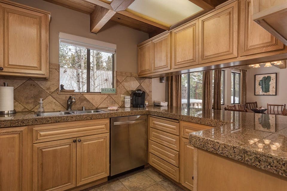 Kitchen stocked with all the chef's tools. Enjoy the view while cooking.