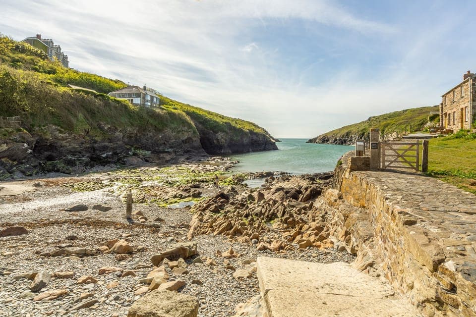 No. 2 The Fish Cellars, Port Isaac. Situated just across the road (literally footsteps from the water) from the picturesque cove at Port Quin