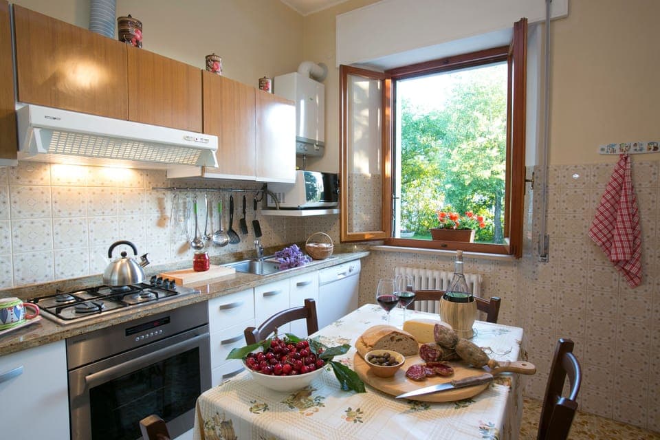 Well equipped kitchen diner overlooking the pool