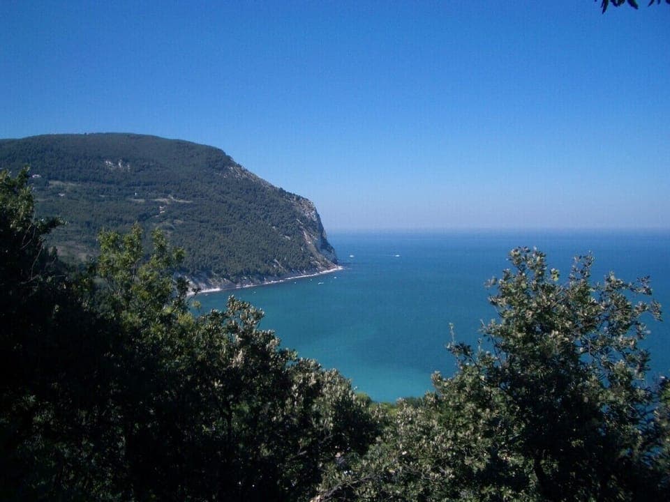 Exquisite beaches of Sirolo are just an hour away