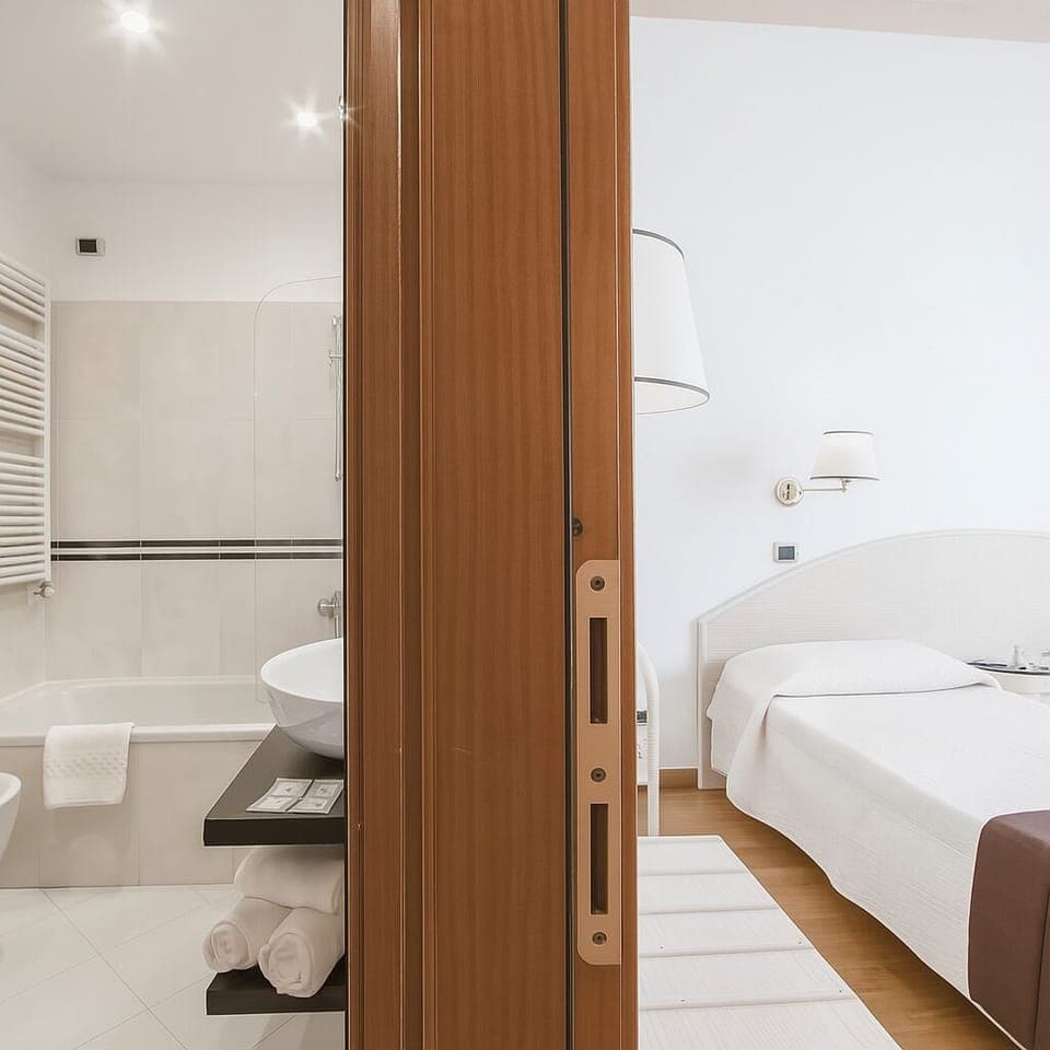 Standard Double Room | Bathroom | Deep soaking tub, rainfall showerhead, free toiletries, hair dryer