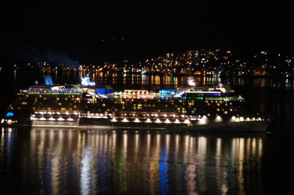 Night view from the terrace. Luxurious cruise ship returning from Kotor.