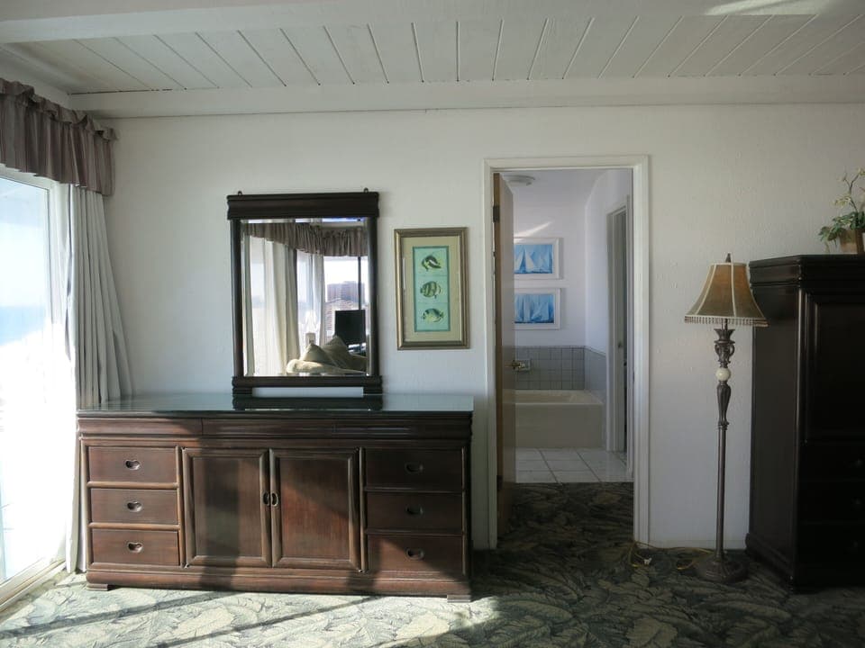 Facing master bathroom with a full bath and shower