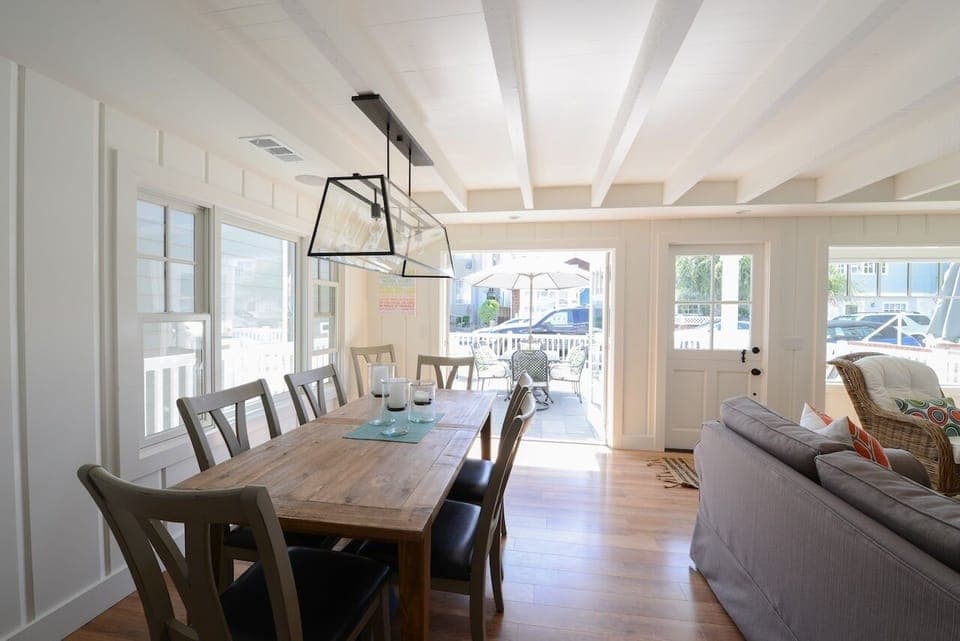 Dining table opens to seat 10. French doors open to patio and outside table. BBQ