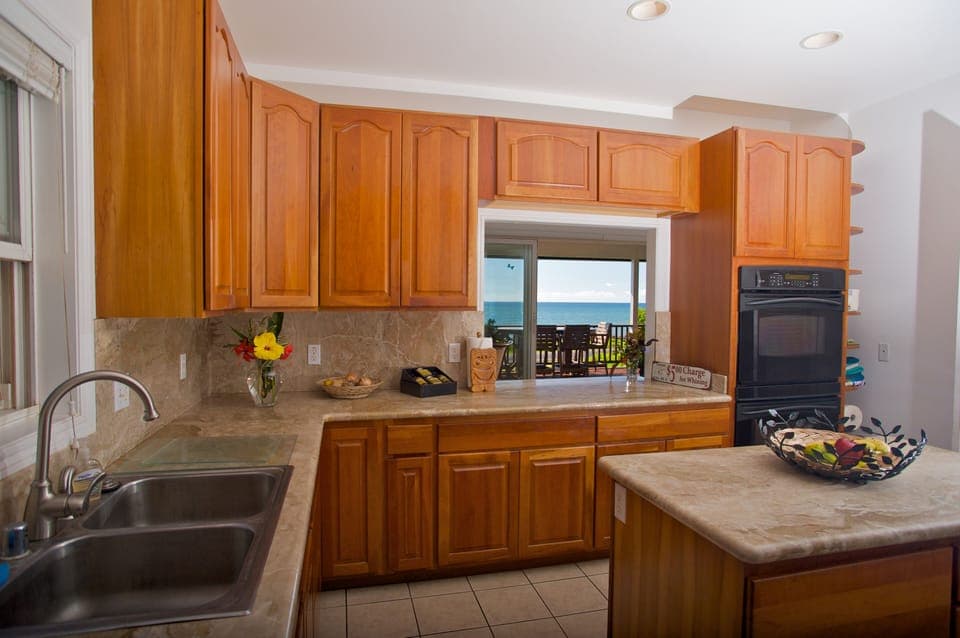 Brand new appliances and high end finishes in your deluxe ocean view kitchen.