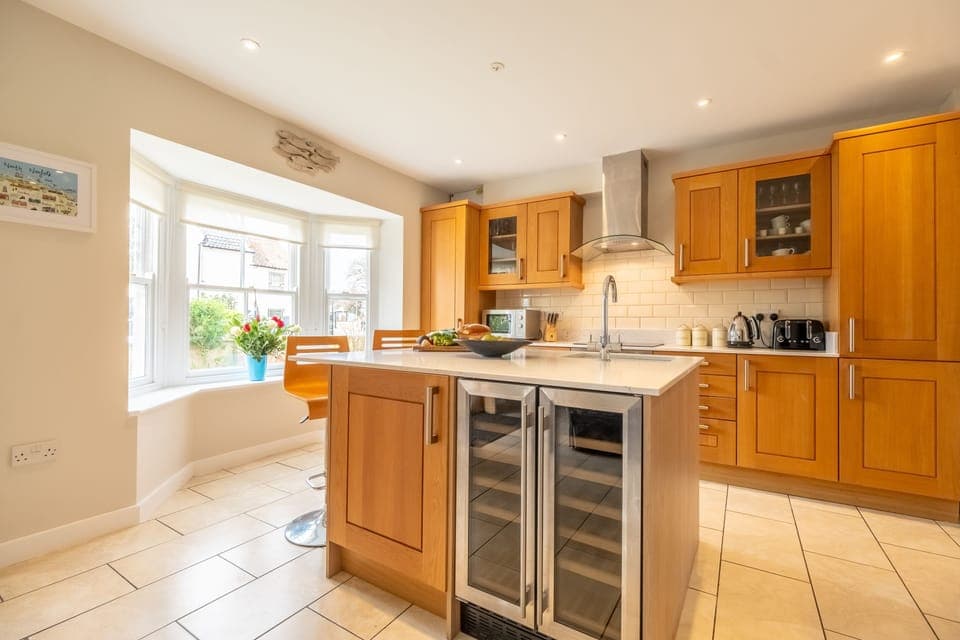 Ground floor:  The front doors open to the kitchen