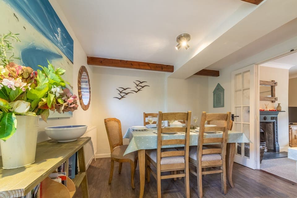 Ground floor: The dining area opens into the sitting room