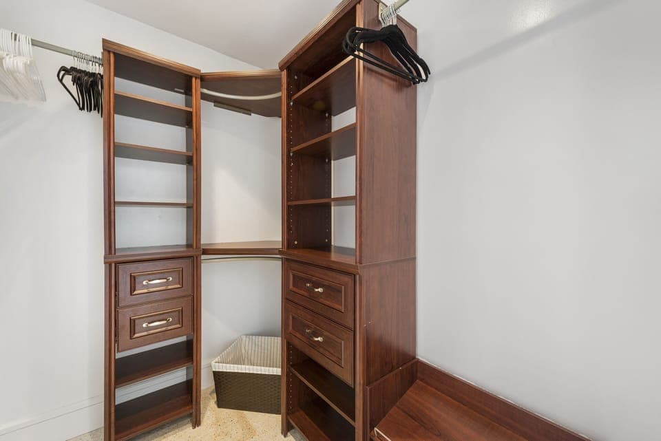 Master Bedroom walk-in closet with organization system. 