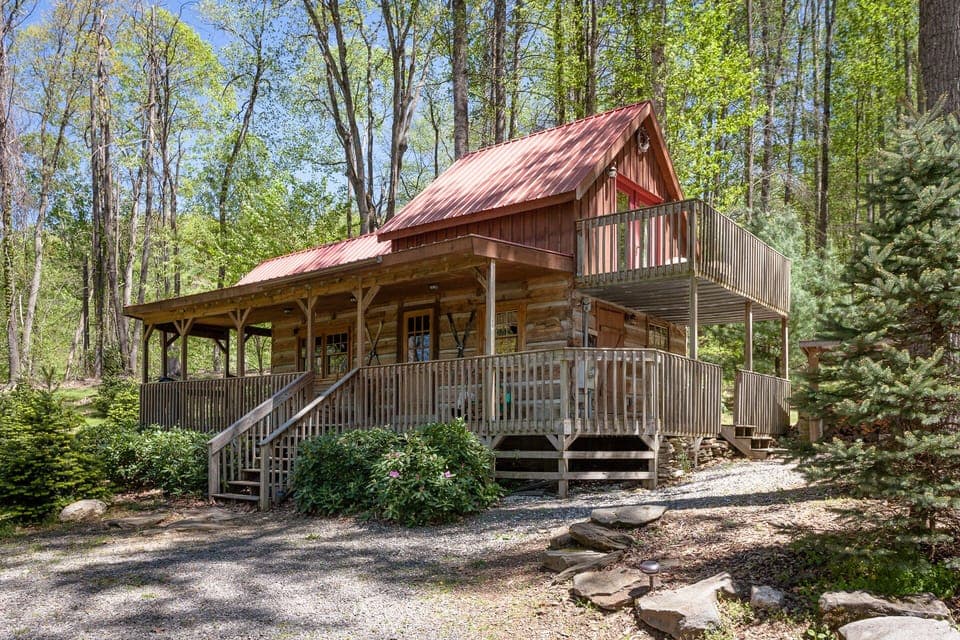Large wrap around covered porch and private  upper deck off bedroom.