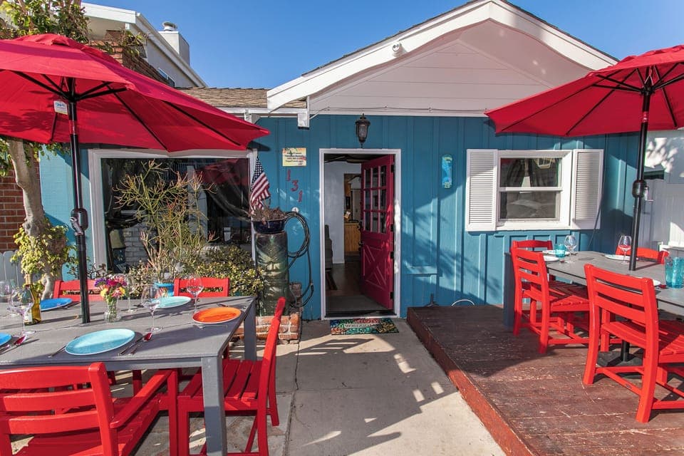 Seating for 12 on front patio and 2 gas BBQs!