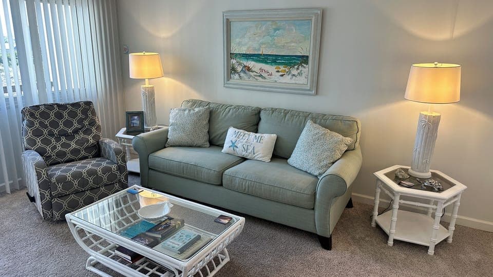 Grace’s seascape showcases her grandchildren enjoying a perfect beach day!