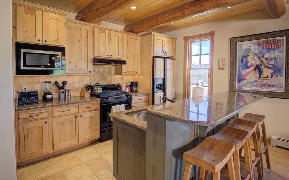 Kitchen island with stools