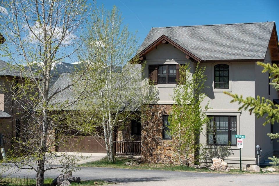 Cabin exterior with mountains in background