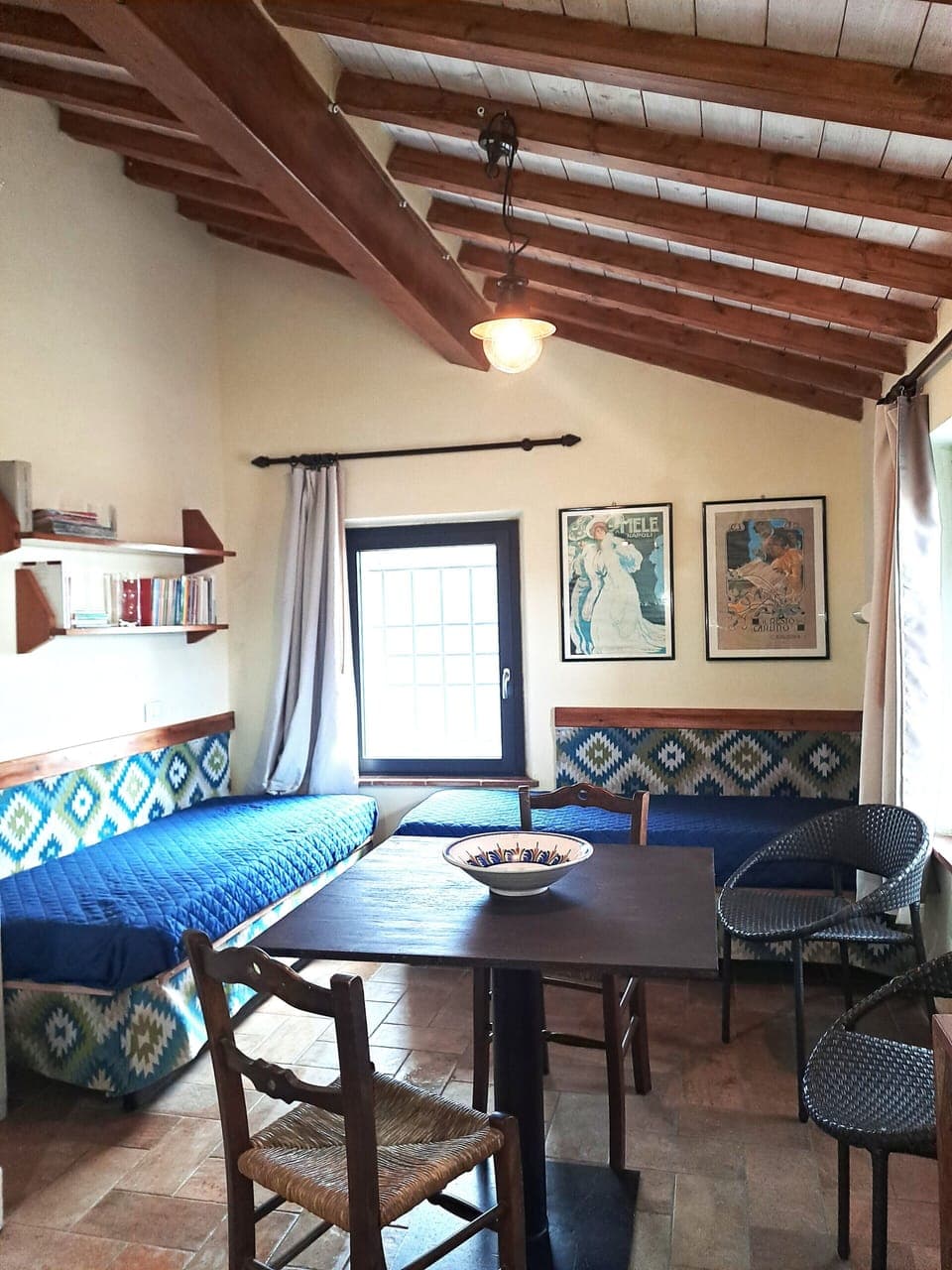 the great studio (20 sqm) with kitchen, three windows, 2 beds-sofa, and table