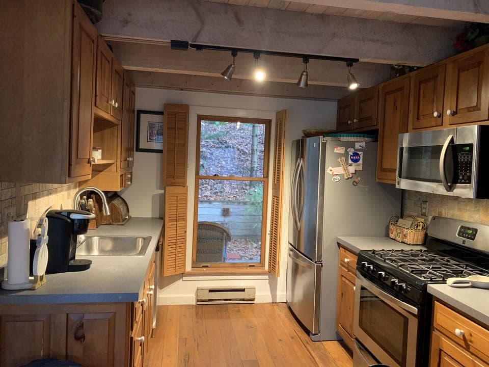 bright kitchen with all. stainless steel appliances