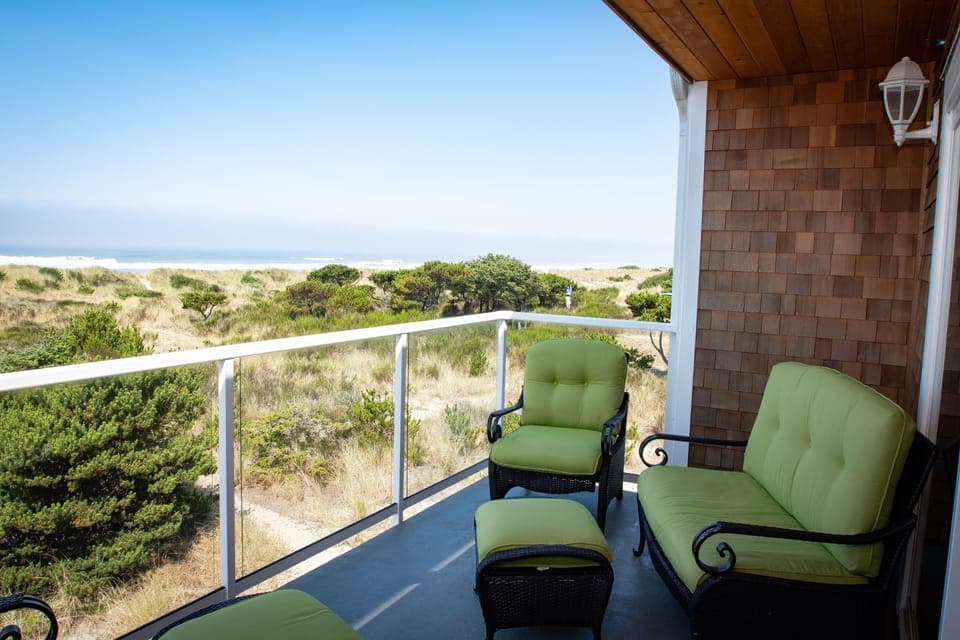 Upper deck with 2 cozy chairs w/ottomans & loveseat, and charcoal grill