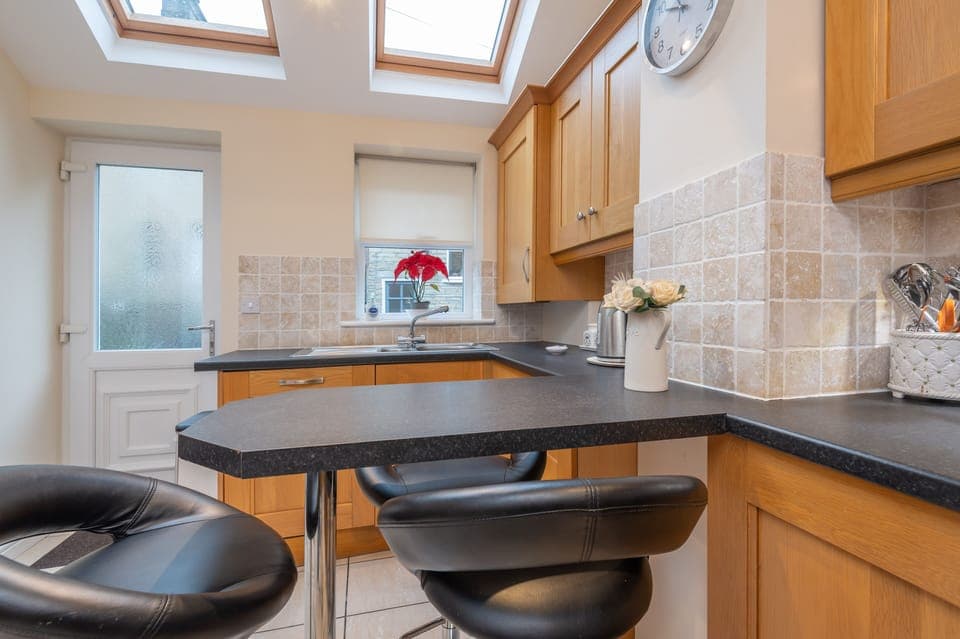Fully equipped kitchen with skylights 