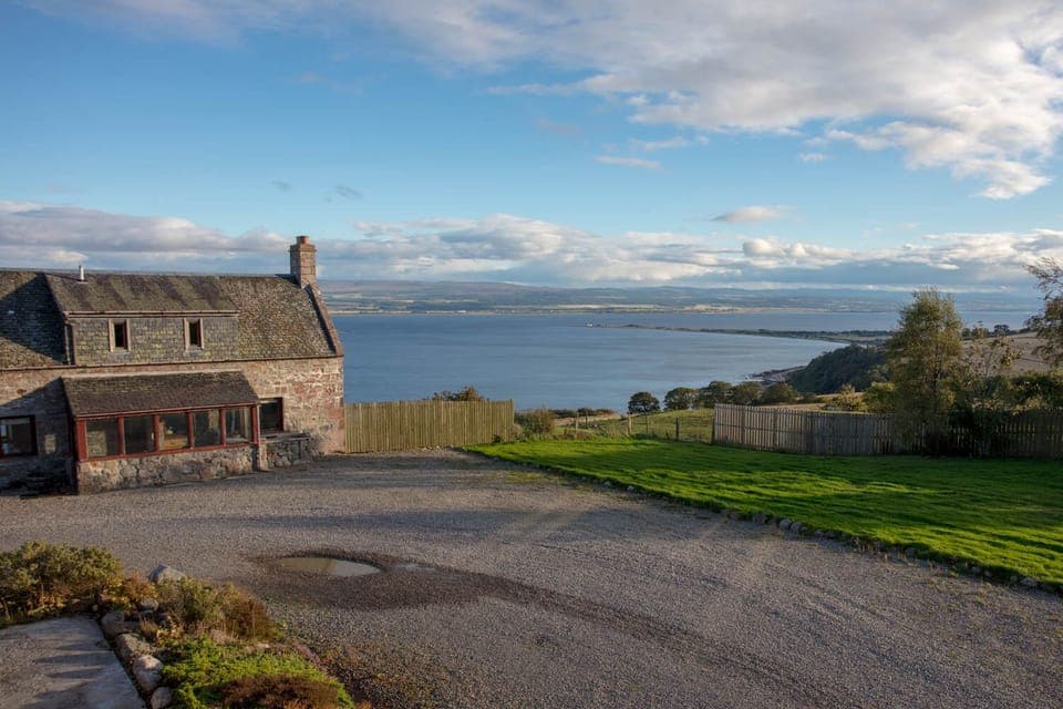 Outside views showing Farmhouse and the views over the Moray Firth.

