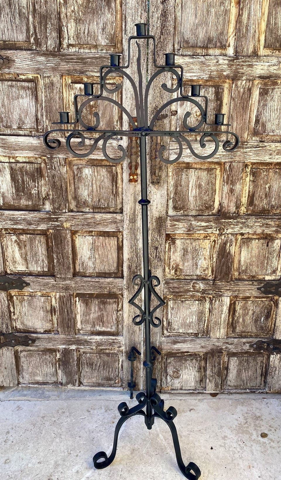 Agua Bonita - Elegant poolside wrought iron candelabra.