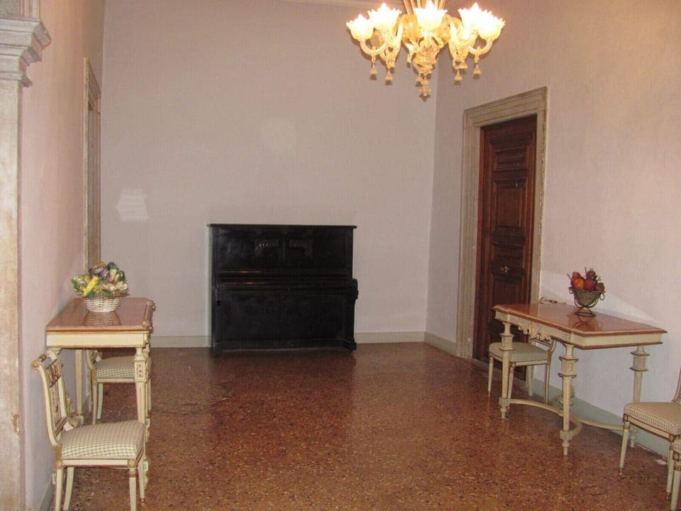 The lobby of the building with piano