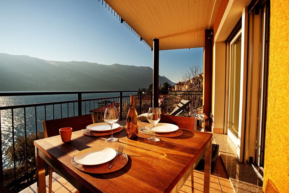 Stay here at Laglio Contemporary Home and dine on your private lake view balcony