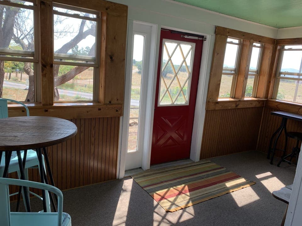 The front room is perfect for enjoying a cup of coffee and soaking in the views.