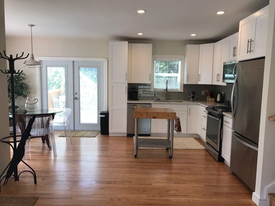 kitchen and dining.  Leads to small deck and backyard