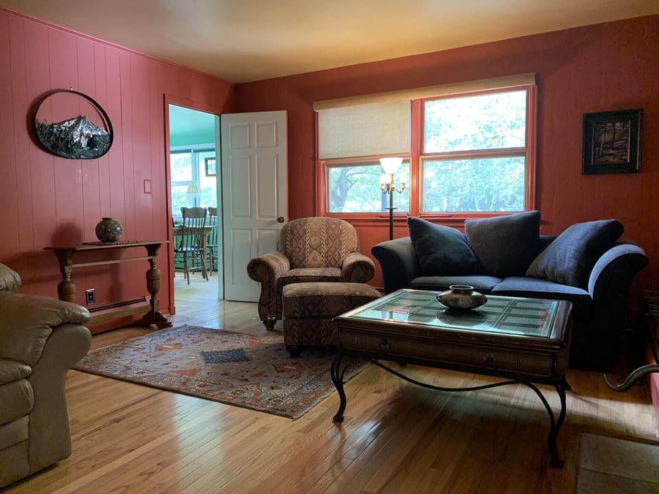 Living room , looking into sunroom/ dining room 