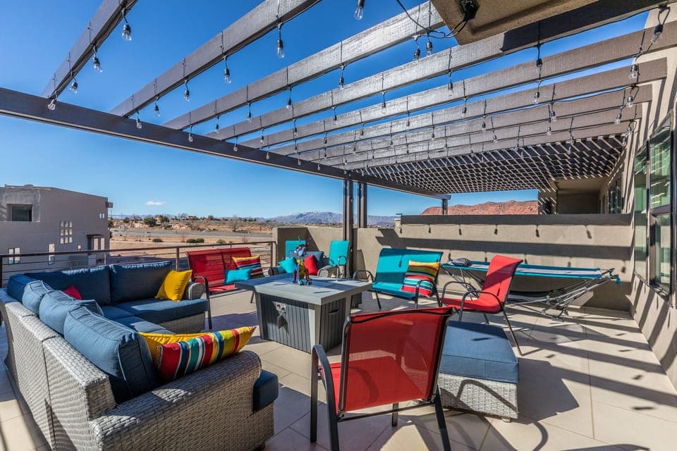 Upstairs Patio - Large deck has a great view, plenty of seating, two hammocks and a gas fire pit.